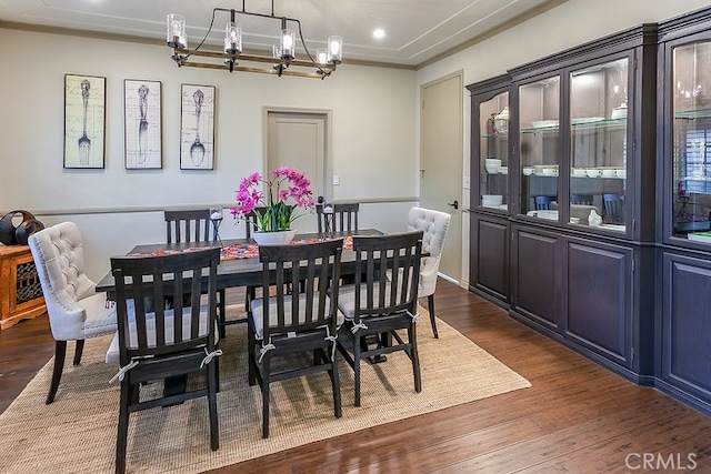 19520 Bermudas St, Porter Ranch, CA 91326 - dining space featuring dark wood-style flooring, a chandelier, crown molding, and recessed lighting