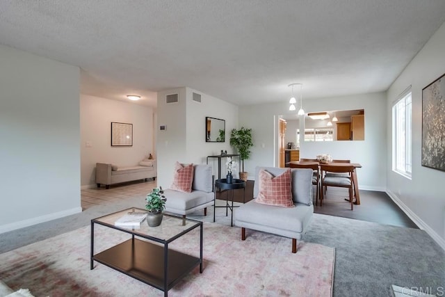 911 S Citrus Ave, Escondido, CA 92027 - living area featuring light carpet and baseboards