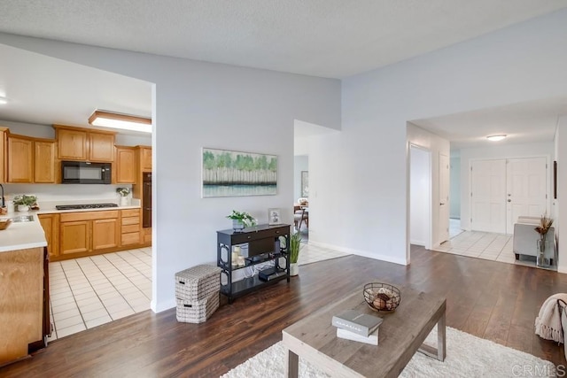 911 S Citrus Ave, Escondido, CA 92027 - living area with wood finished floors and lofted ceiling