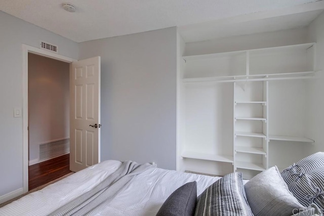 911 S Citrus Ave, Escondido, CA 92027 - bedroom featuring wood finished floors and baseboards