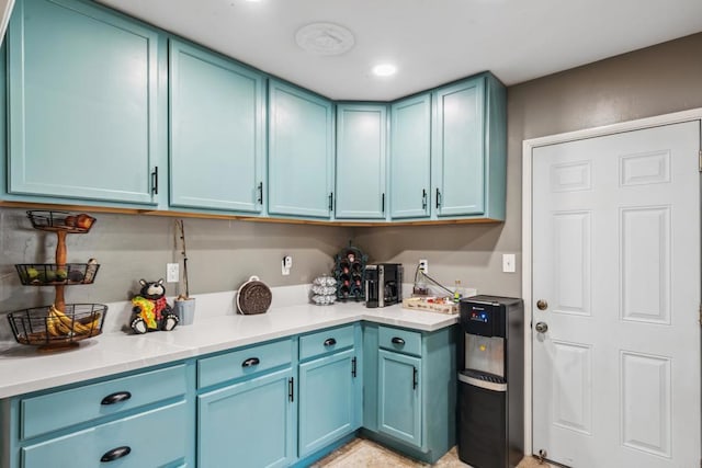 3443 Trophy Dr, La Mesa, CA 91941 - kitchen featuring blue cabinets and light countertops
