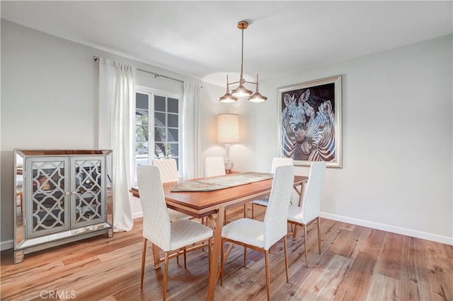 1276 Sao Paulo Ave, Placentia, CA 92870 - dining room with light wood-style floors and baseboards