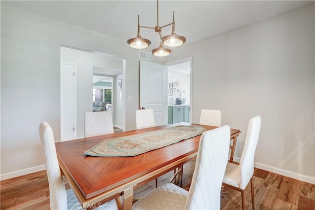 1276 Sao Paulo Ave, Placentia, CA 92870 - dining area featuring light wood finished floors and baseboards