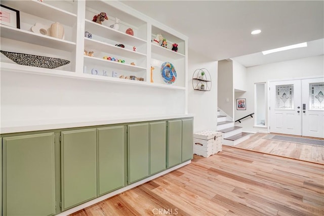 1276 Sao Paulo Ave, Placentia, CA 92870 - corridor featuring light wood-style floors, stairs, a skylight, and recessed lighting