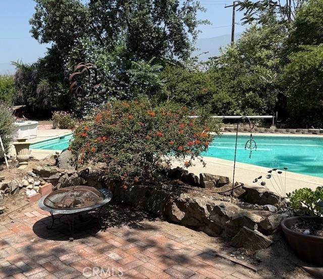 984 E Lynwood Dr, San Bernardino, CA 92404 - outdoor pool featuring a patio area