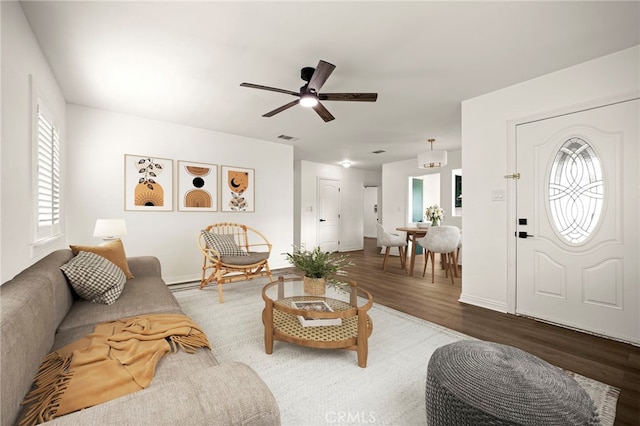 2871 Adriatic Ave, Long Beach, CA 90810 - living room with wood finished floors and ceiling fan