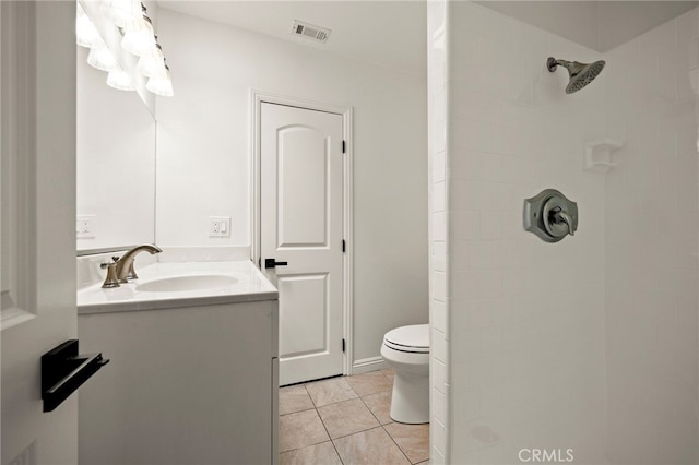 2871 Adriatic Ave, Long Beach, CA 90810 - bathroom with vanity, tiled shower, and tile patterned flooring