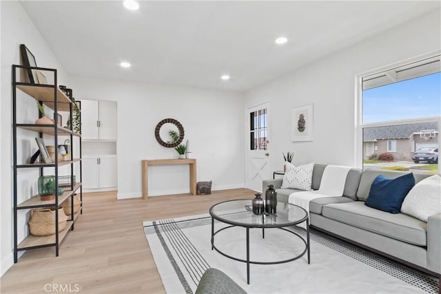 14867 Roxton Ave, Gardena, CA 90249 - living room with light wood-style flooring and recessed lighting
