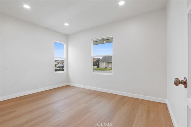 14867 Roxton Ave, Gardena, CA 90249 - empty room with light wood finished floors and recessed lighting