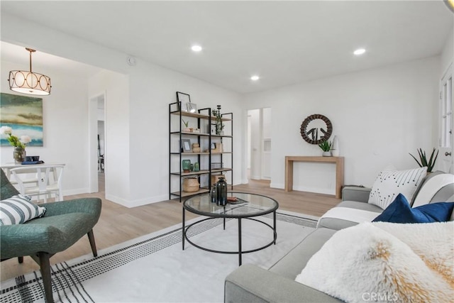 14867 Roxton Ave, Gardena, CA 90249 - living room with light wood-style flooring and recessed lighting