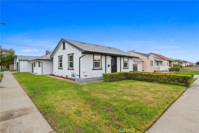 14867 Roxton Ave, Gardena, CA 90249 - view of front facade with stucco siding and a front yard