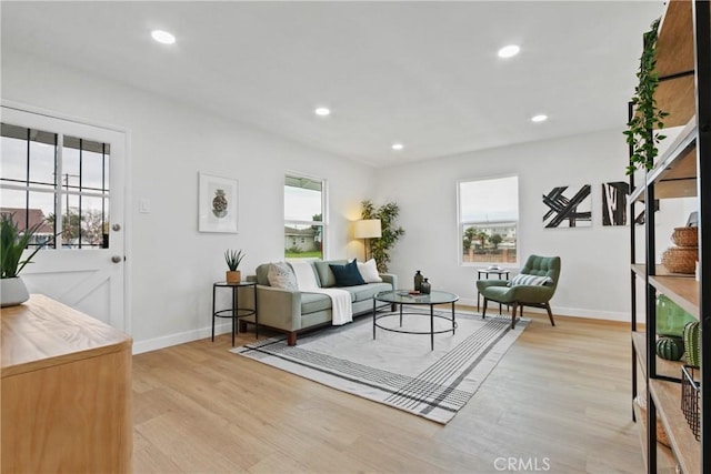 14867 Roxton Ave, Gardena, CA 90249 - living room with light wood finished floors and recessed lighting