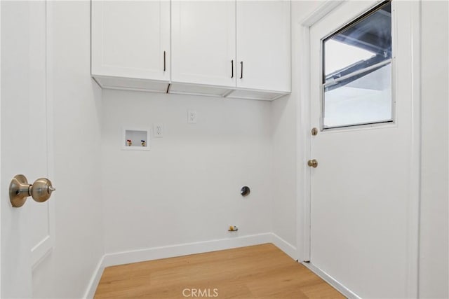 14867 Roxton Ave, Gardena, CA 90249 - laundry area with cabinet space, hookup for a washing machine, and light wood finished floors