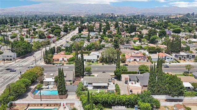 20042 Lassen St, Chatsworth, CA 91311 - aerial perspective of suburban area featuring mountains and a pool area
