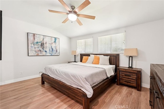 20042 Lassen St, Chatsworth, CA 91311 - bedroom with light wood-style flooring, vaulted ceiling, and ceiling fan