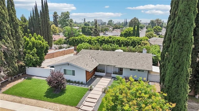 20042 Lassen St, Chatsworth, CA 91311 - view of front of house with a shingled roof, stucco siding, and a chimney