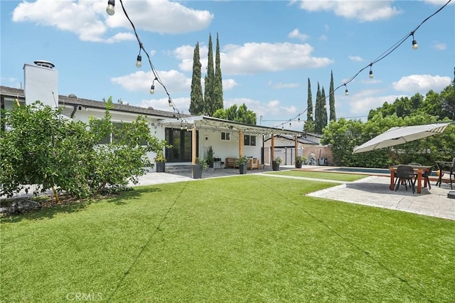 20042 Lassen St, Chatsworth, CA 91311 - rear view of property featuring a patio, a pergola, and a pool