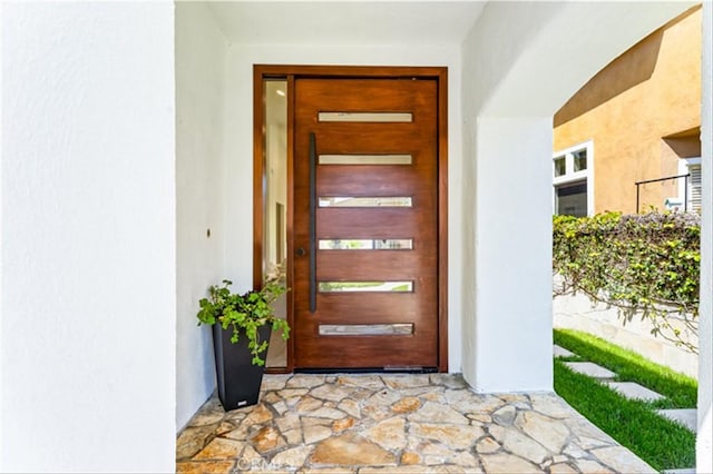 15 Glastonbury Pl, Laguna Niguel, CA 92677 - view of exterior entry featuring stucco siding