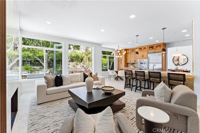 15 Glastonbury Pl, Laguna Niguel, CA 92677 - living room with recessed lighting and a chandelier