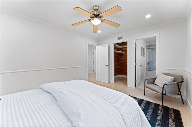 15 Glastonbury Pl, Laguna Niguel, CA 92677 - bedroom featuring light wood finished floors, a spacious closet, recessed lighting, ornamental molding, and ceiling fan