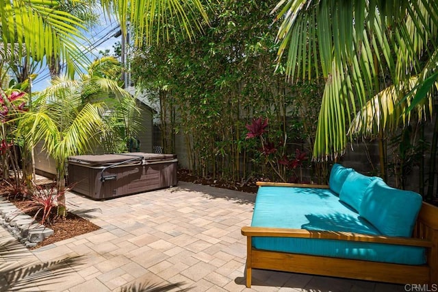 121 Cadmus St, Encinitas, CA 92024 - view of patio / terrace with a hot tub