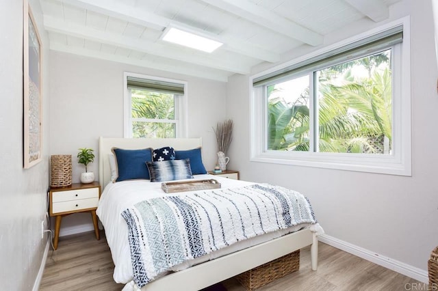 121 Cadmus St, Encinitas, CA 92024 - bedroom featuring beam ceiling and wood finished floors