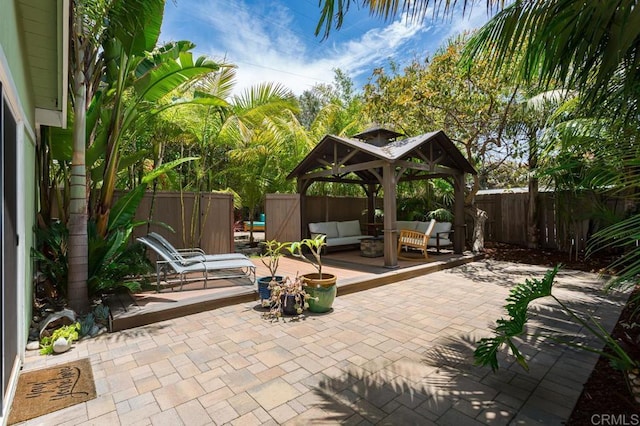 121 Cadmus St, Encinitas, CA 92024 - fenced backyard with a gazebo, an outdoor living space, and a patio area