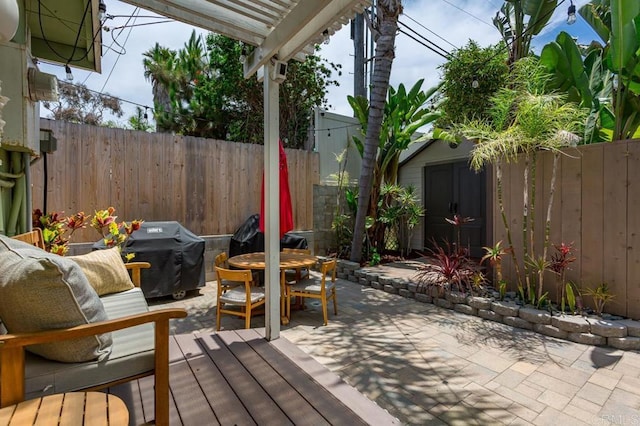 121 Cadmus St, Encinitas, CA 92024 - view of patio with a grill, outdoor dining space, an outdoor structure, and a wooden deck