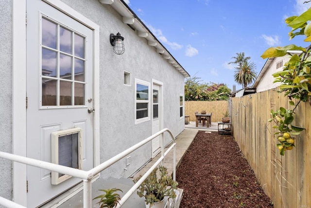 216466 S 40th St, San Diego, CA 92113 - view of side of home featuring a fenced backyard, a patio, stucco siding, and crawl space