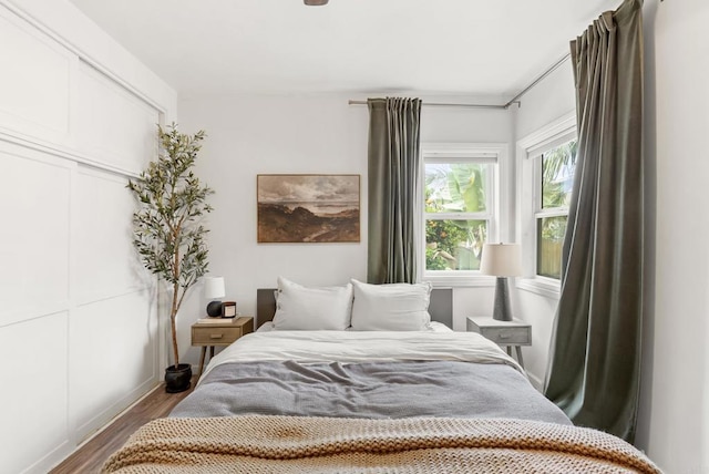 216466 S 40th St, San Diego, CA 92113 - bedroom with wood finished floors and a closet