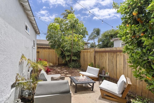 216466 S 40th St, San Diego, CA 92113 - fenced backyard featuring a fire pit and a patio area