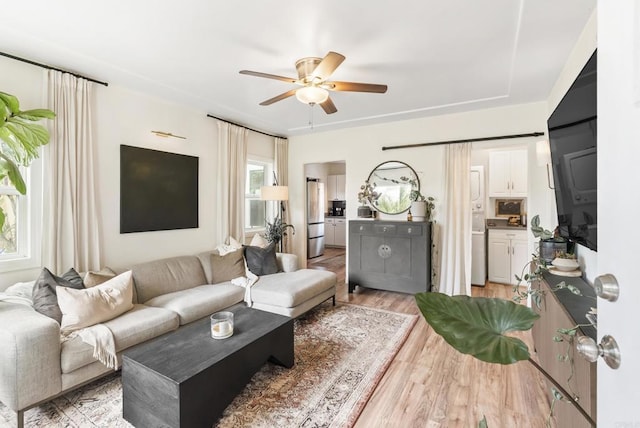 216466 S 40th St, San Diego, CA 92113 - living room featuring ceiling fan and light wood-type flooring
