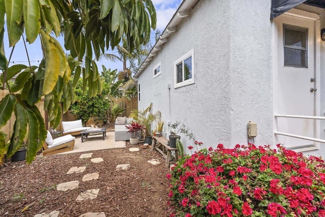 216466 S 40th St, San Diego, CA 92113 - view of property exterior with stucco siding and a patio area