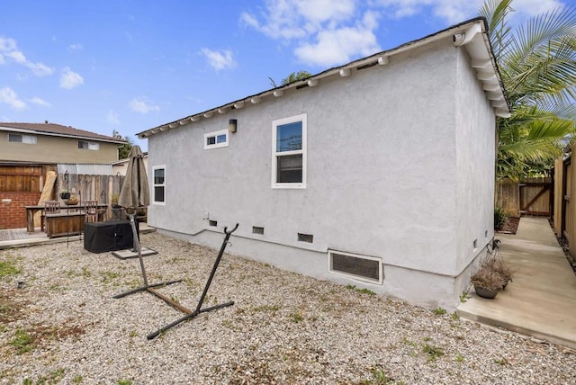 216466 S 40th St, San Diego, CA 92113 - rear view of house with a fenced backyard and stucco siding