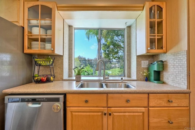 1675 Bronco Way, Oceanside, CA 92057 - kitchen featuring dishwasher, glass insert cabinets, and decorative backsplash