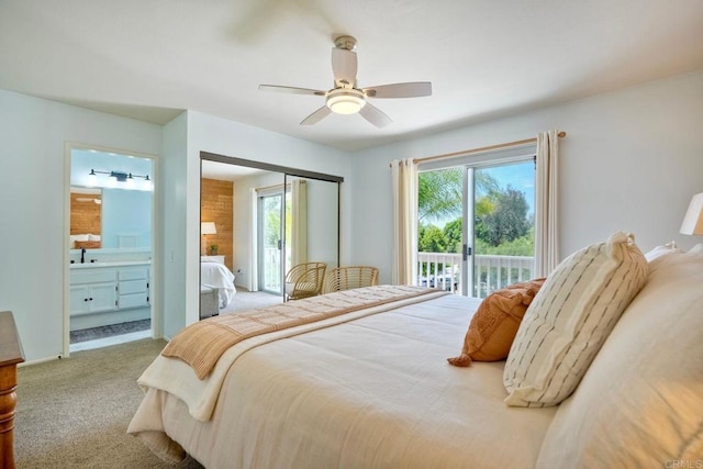 1675 Bronco Way, Oceanside, CA 92057 - carpeted bedroom with access to exterior, multiple windows, ensuite bathroom, and a ceiling fan