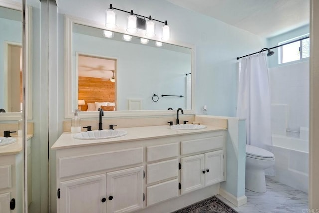 1675 Bronco Way, Oceanside, CA 92057 - bathroom with double vanity, shower / bath combo, and marble look tile flooring