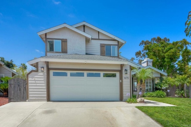 1675 Bronco Way, Oceanside, CA 92057 - view of front of property with driveway, an attached garage, and a front lawn