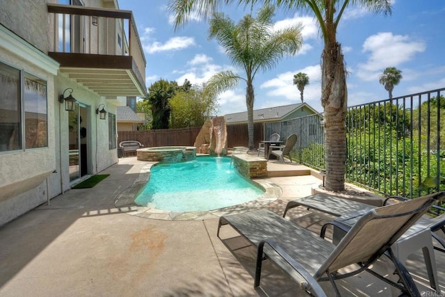 1675 Bronco Way, Oceanside, CA 92057 - view of pool featuring a pool with connected hot tub, a patio, and a fenced backyard
