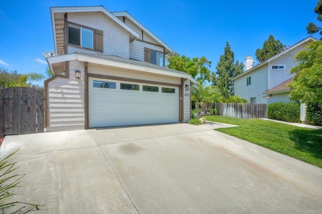 1675 Bronco Way, Oceanside, CA 92057 - view of front facade featuring concrete driveway, a garage, a gate, and stucco siding