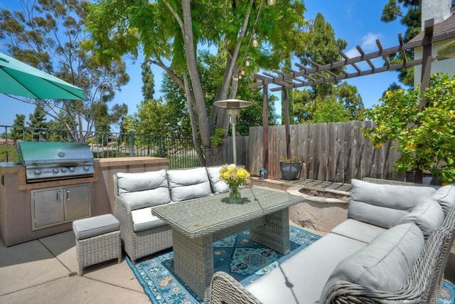 1675 Bronco Way, Oceanside, CA 92057 - view of patio / terrace featuring an outdoor hangout area, a pergola, and an outdoor kitchen