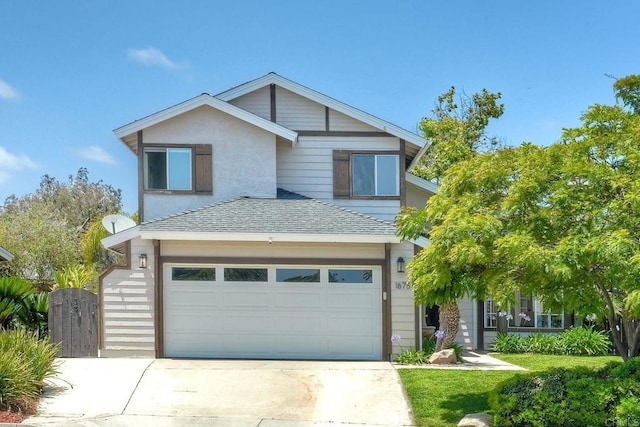 1675 Bronco Way, Oceanside, CA 92057 - traditional-style home featuring a garage, concrete driveway, and roof with shingles