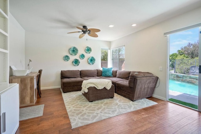 1675 Bronco Way, Oceanside, CA 92057 - living area with ceiling fan, wood finished floors, and recessed lighting