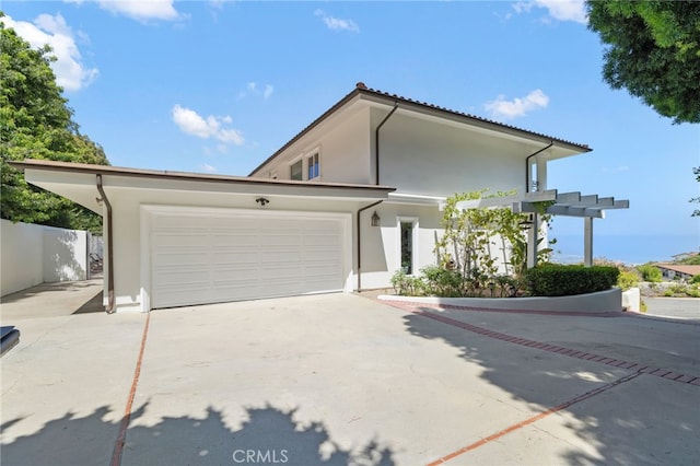 29603 Highpoint Rd, Rancho Palos Verdes, CA 90275 - view of front of property with stucco siding, a garage, and concrete driveway