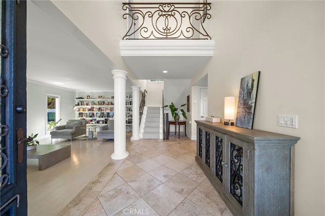 29603 Highpoint Rd, Rancho Palos Verdes, CA 90275 - entryway featuring ornate columns, crown molding, and stairs