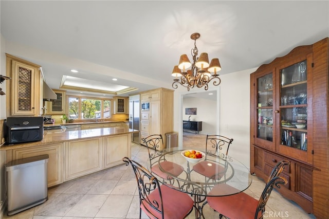 29603 Highpoint Rd, Rancho Palos Verdes, CA 90275 - dining space with a chandelier, a raised ceiling, light tile patterned floors, and recessed lighting