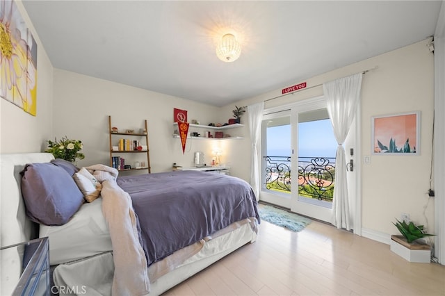29603 Highpoint Rd, Rancho Palos Verdes, CA 90275 - bedroom with access to exterior and light wood-style floors