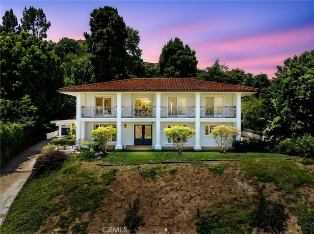 29603 Highpoint Rd, Rancho Palos Verdes, CA 90275 - view of front of property with french doors, a balcony, a tile roof, and stucco siding