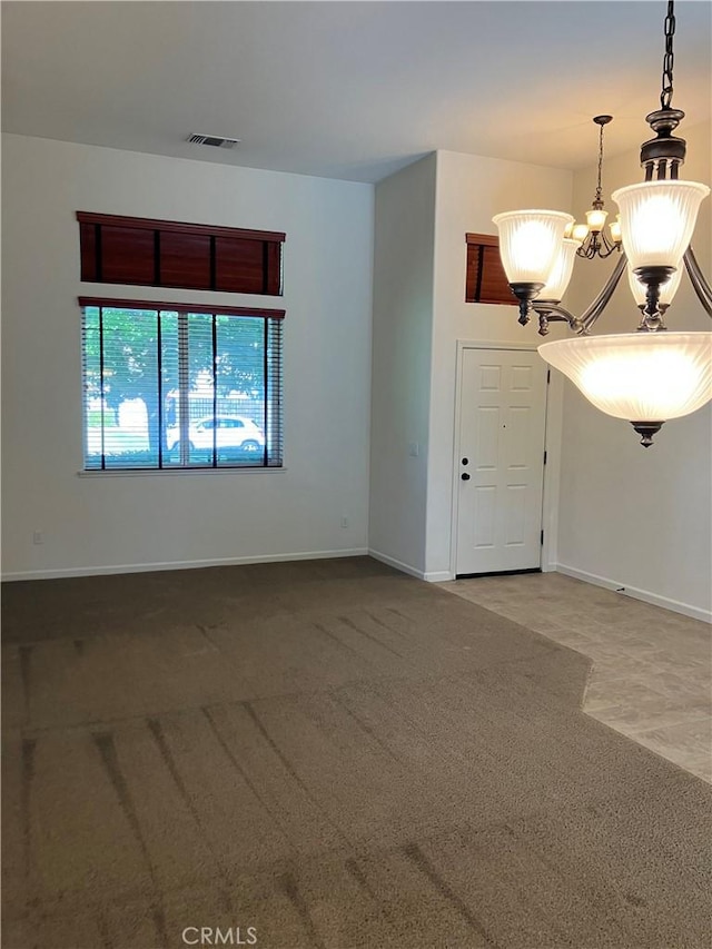 1830 Nevada St, Gridley, CA 95948 - empty room featuring a chandelier and carpet floors