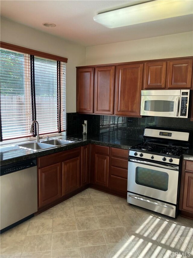 1830 Nevada St, Gridley, CA 95948 - kitchen featuring appliances with stainless steel finishes and decorative backsplash